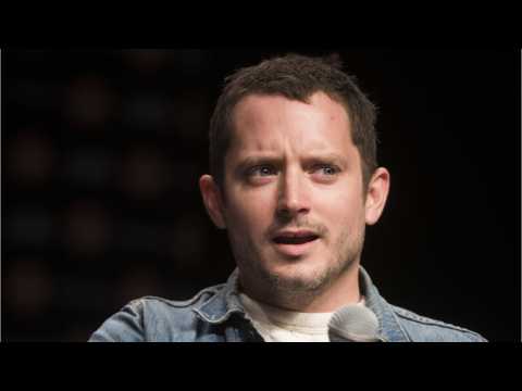 VIDEO : Elijah Wood Reacts To How Much Money Amazon Is Spending On A 'LOTR' Series