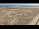 Dunkerque : il dessine sur le sable de Malo en hommage aux soignants
