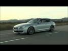 New BMW 6 Series Convertible Driving shots soft top closed