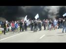 Striking ferry workers set fires to block Chunnel