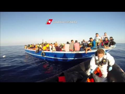 Italian coastguard rescues migrants stranded off the Libyan coast