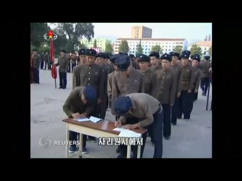 North Koreans sign up to fight the South: state media