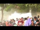 Macedonia fires tear gas at migrants