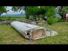 Too early to say if debris in Reunion is from MH370 flight - police
