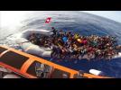 Migrants rescued from sea before dinghy deflates