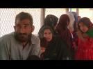 Afghan refugees return home reluctantly