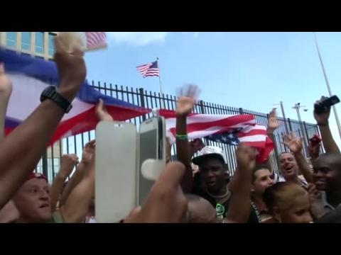 Kerry urges 'genuine democracy' as U.S. flag is raised in Havana
