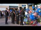 Hundreds pay tribute to police officer killed at a Texas petrol station