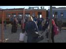 Migrants board north-bound train from Macedonia