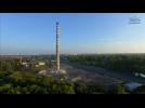 Tall chimney demolished with explosives in Poland