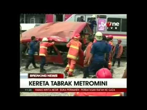 At least 18 dead in Jakarta bus, train crash