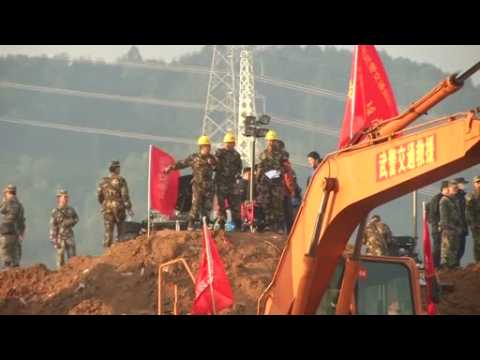 Body found in China landslide search