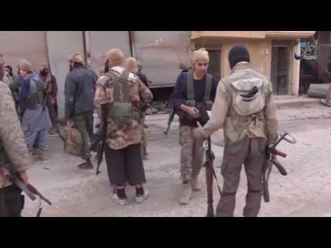 Islamic State militants fight to capture district in Syrian city - amateur video