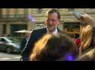 Spain's Rajoy back to campaigning after punch in face
