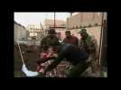 Iraqi troops help free families trapped by fighting in Ramadi