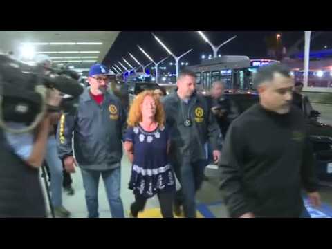Handcuffed mother of 'affluenza' teen arrives in L.A.