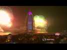 Dubai fireworks kick off as nearby tower burns