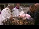 Pope Francis baptizes 26 babies in Sistine Chapel