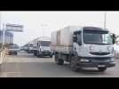 Aid convoys leave for starved Syrian town