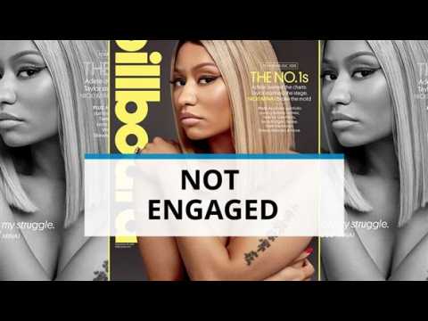 Topless Nicki Minaj squashes engagement rumors