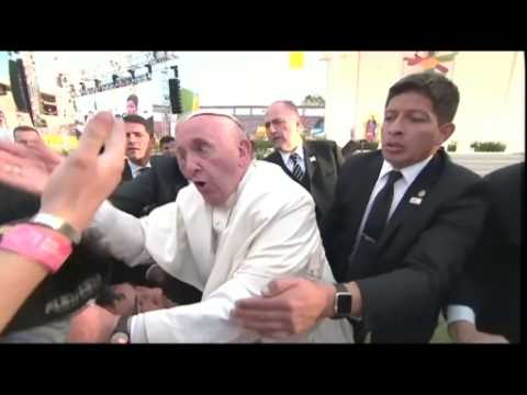 Pope visibly annoyed when grabbed by crowd