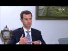 Assad calls for end of Syria embargo