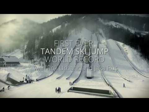Ski jumpers duo performs tandem ski jump
