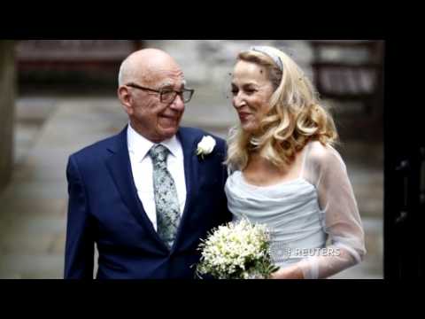 Wedding bells ring again for Murdoch, Hall