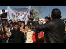 Migrants call for Germany's help at Greek-Macedonia border