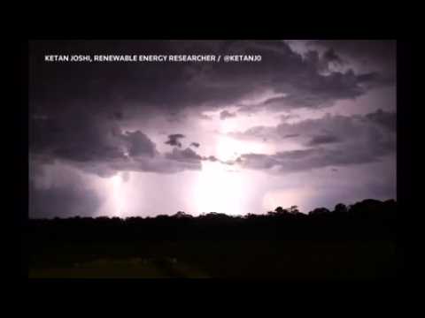 Amateur photographer takes advantage as lightning storm fires up sky near Taronga Western Plains Zoo