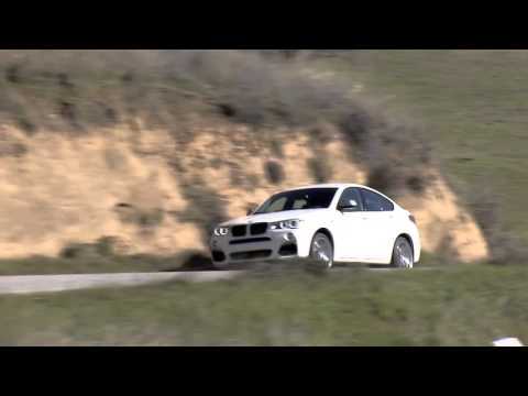The new BMW X4 M40i Driving Video at Laguna Seca | AutoMotoTV