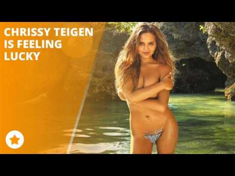 Topless Chrissy Teigen brushes off the haters
