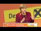 Merkel defends migrant stance before 'Super Sunday'