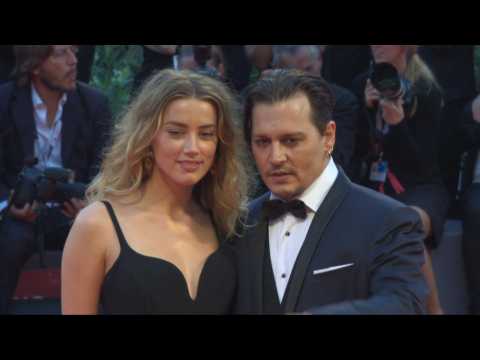 Johnny Depp And Amber Heard Are In Big Trouble Over An iPhone