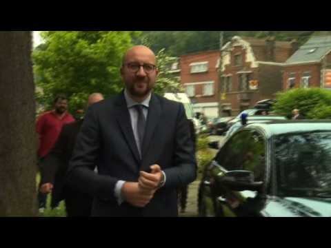 Belgium's King and Prime Minister visit train crash site