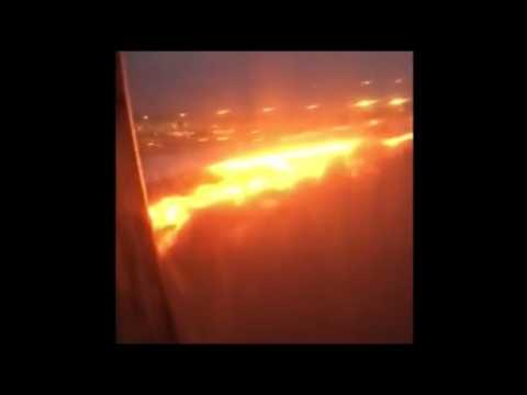 Singapore Airlines plane catches fire