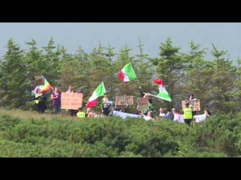 Protesters and Mexican flags greet Trump at Scottish golf course