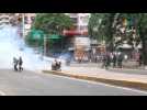 Venezuelan police fire tear gas at food shortage protests