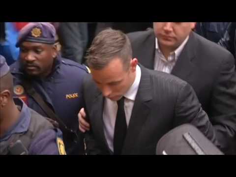 Oscar Pistorius arrives at court for murder sentencing