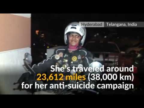 Indian woman on anti-suicide bike ride campaign