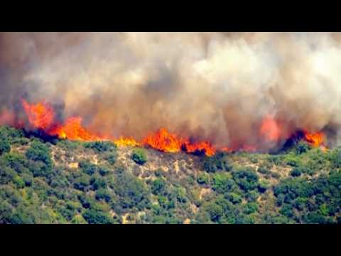 Dual brush fires near L.A. add to heat woes