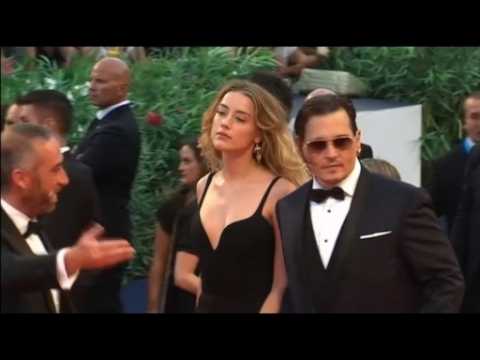 Amber Heard granted restraining order against Johnny Depp
