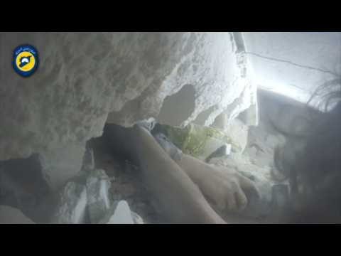Video shows woman's rescue from Aleppo rubble