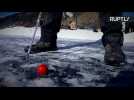 Golfers Tee Off On Frozen Lake Baikal for Ice Golf Competition