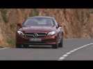 The new Mercedes-Benz E 220 d 4MATIC Coupe Driving Video in Hyacinth Red Metallic Trailer