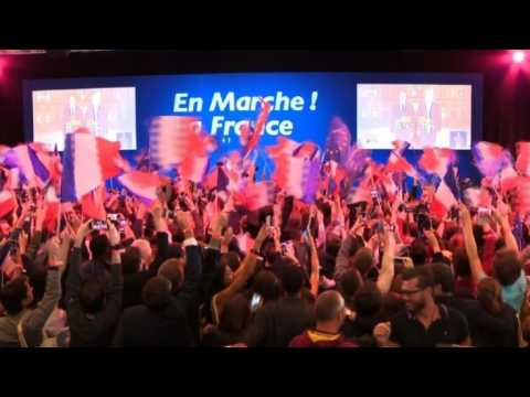 French vote: joy at Macron HQ as Macron, Le Pen shown ahead