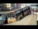 Bus and Car Swallowed by Sinkhole in Eastern India