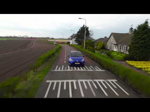 2017 Toyota Yaris Hybrid Driving Video in Blue | AutoMotoTV