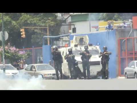 Venezuelan police fire tear gas at anti-Maduro protesters