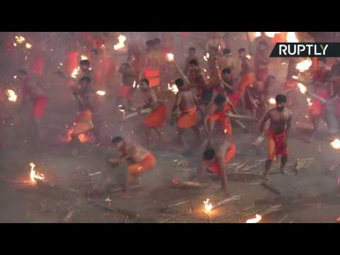 Hindu Devotees Fight Fire with Fire to Appease Goddess Durga For Agni Keli